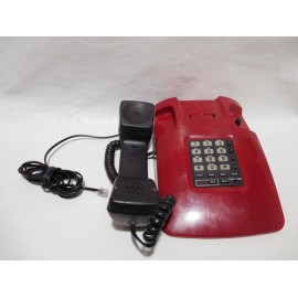 Telefono vintage americano en rojo y negro funcionando.