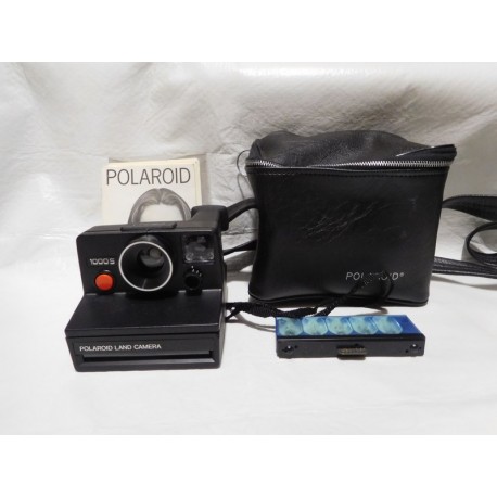 Antigua camara de fotos Polaroid 1000s con funda e instrucciones.