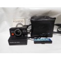 Antigua camara de fotos Polaroid 1000s con funda e instrucciones.
