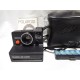 Antigua camara de fotos Polaroid 1000s con funda e instrucciones.