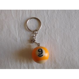 Llavero bola de billar amarilla numero 9. Años 80