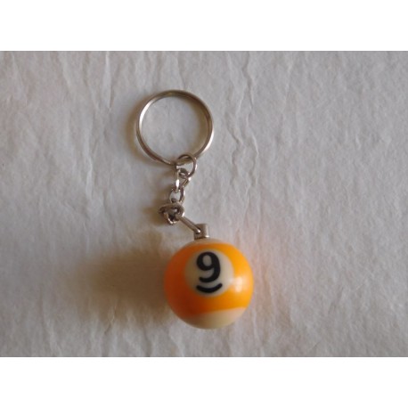 Llavero bola de billar amarilla numero 9. Años 80