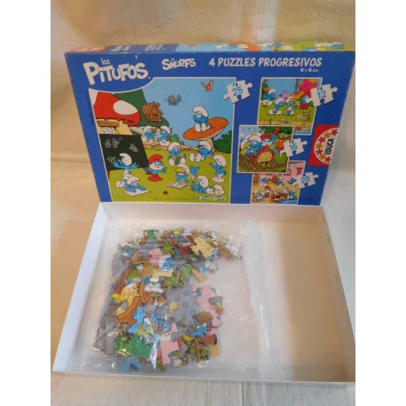 Caja con 4 puzzles progresivos de Los Pitufos. Educa.