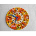 Reloj para aprender las horas con ilustraciones y agujas en plástico. Años 60-70.
