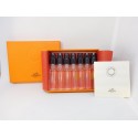 Lote de viales Hermes Parfums. 7 x 2 ml. Collection Colognes Hermes. Con libro explicativo.