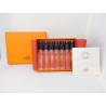 Lote de viales Hermes Parfums. 7 x 2 ml. Collection Colognes Hermes. Con libro explicativo.
