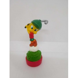 Figura de pvc con sello de Piolín golfista. Piolín jugando al golf.