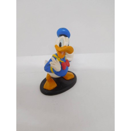 Figura del pato Donald con peana. Applause.