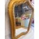 Antiguo espejo con forma original todo de madera tallada y pan de oro Art Deco circa 20 30