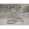 Antiguas botellas de brandy de Domecq tipo petaca con tapón metálico. Años 50.